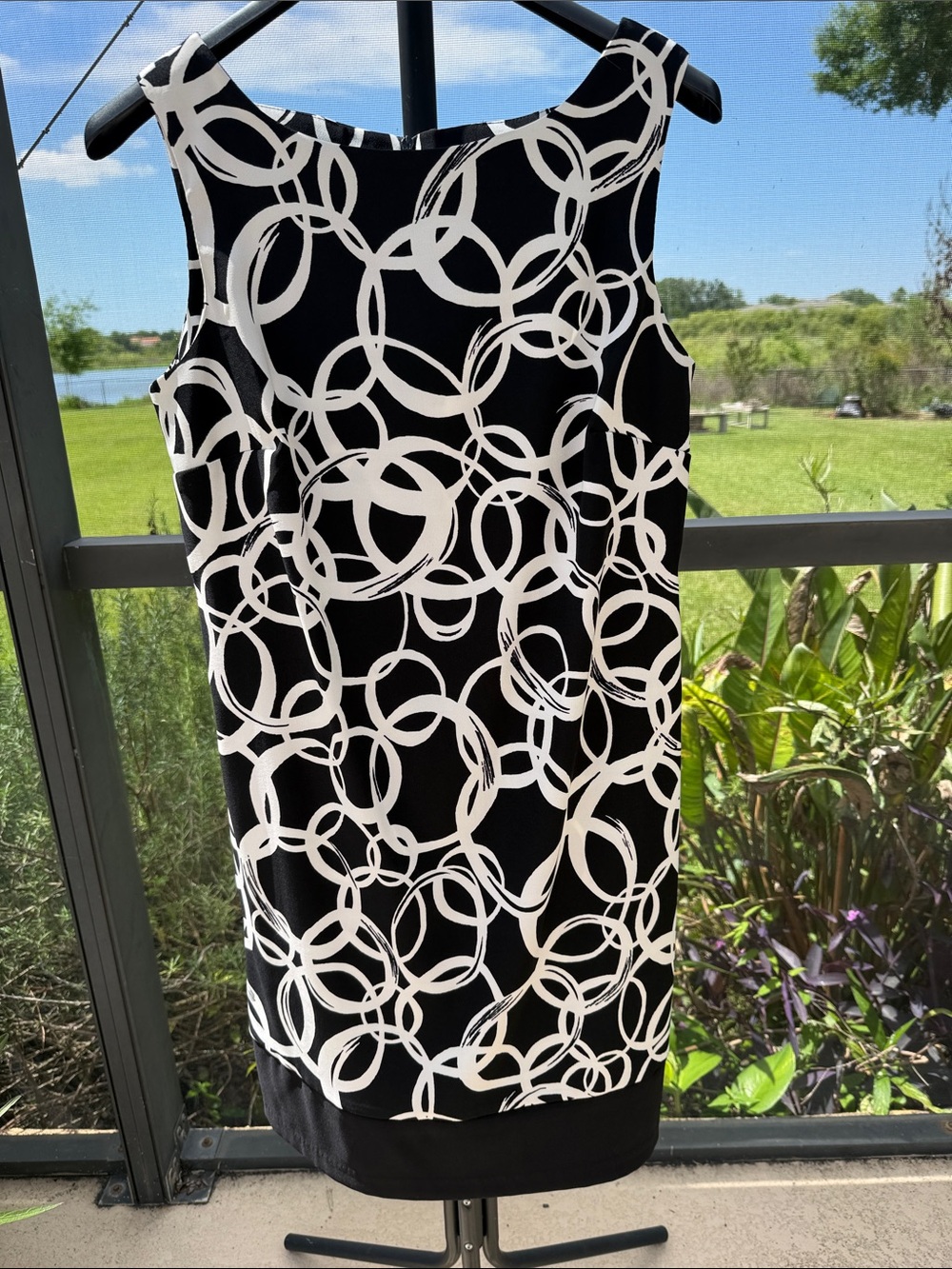 Sleeveless Black & White Midi Dress with Graphic Circle Print